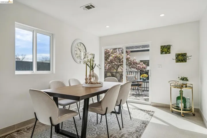 Dining area with baseboards and recessed lighting