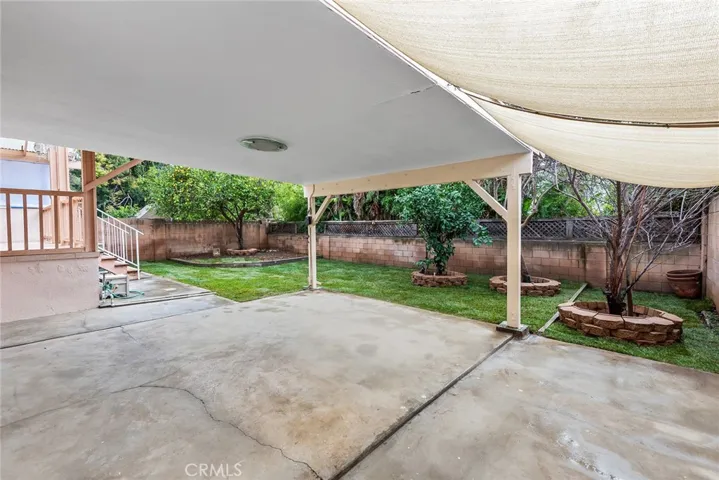 Second patio off family Room overlooking yard.