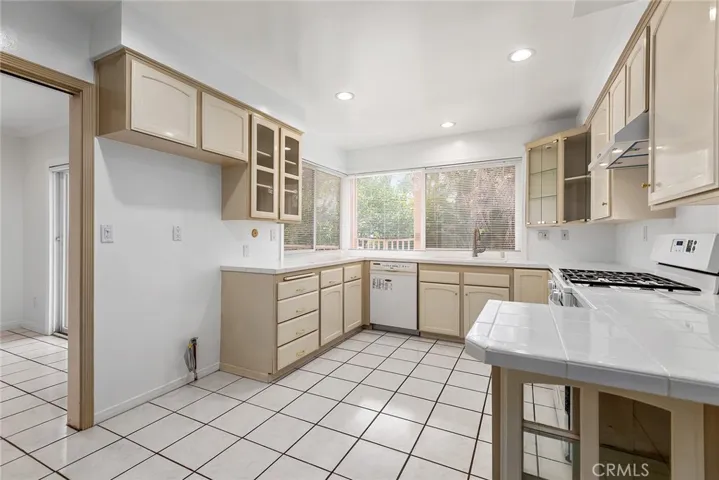 Kitchen overlooking backyard