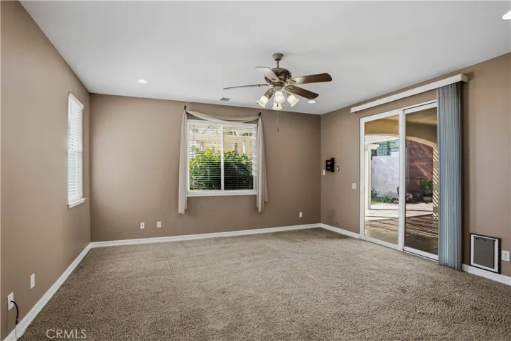 Primary Bedroom walks out to Back Patio