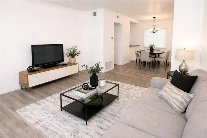 Virtually Staged Livingroom and Dining