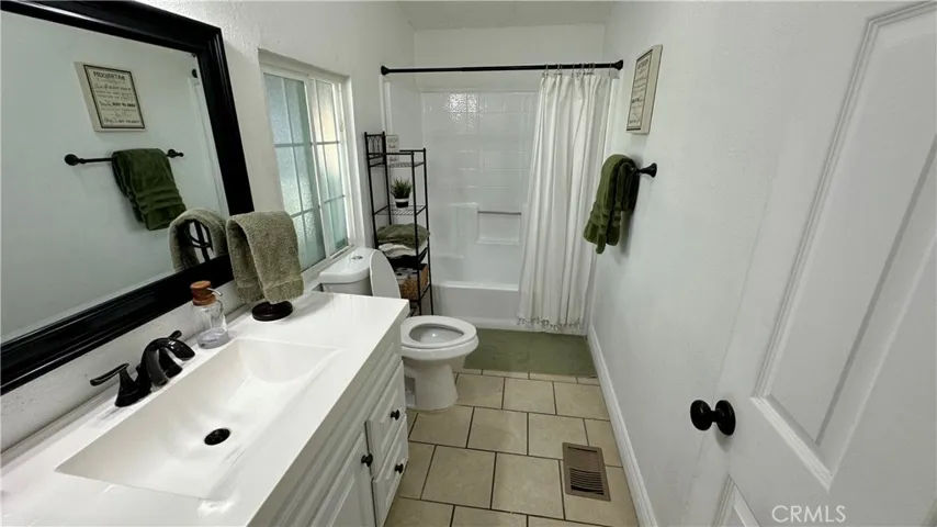 Master bathroom with reglazed shower