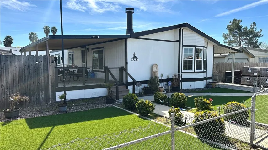 Front of house from left corner