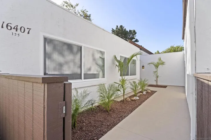 Enclosed, low maintenance front courtyard.