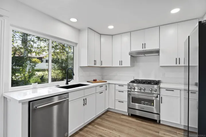 Brand new Kitchen, including all cabinets, appliances, new lighting and exquisite quartz counters