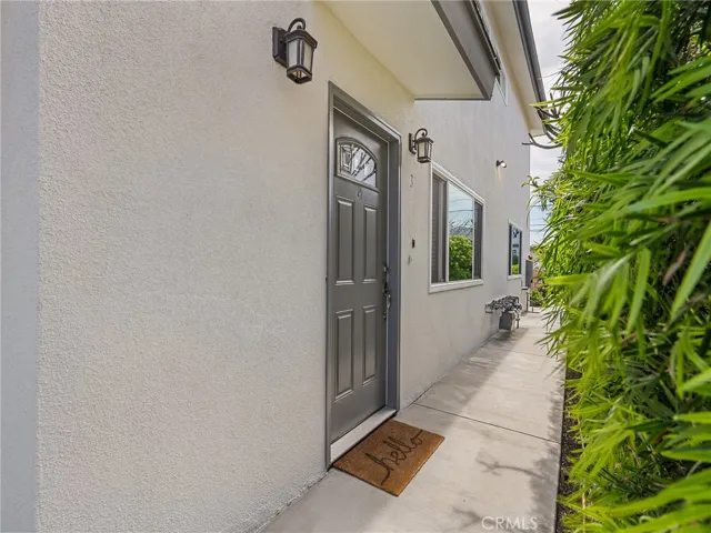 West-side of building, showing entrance unit 3