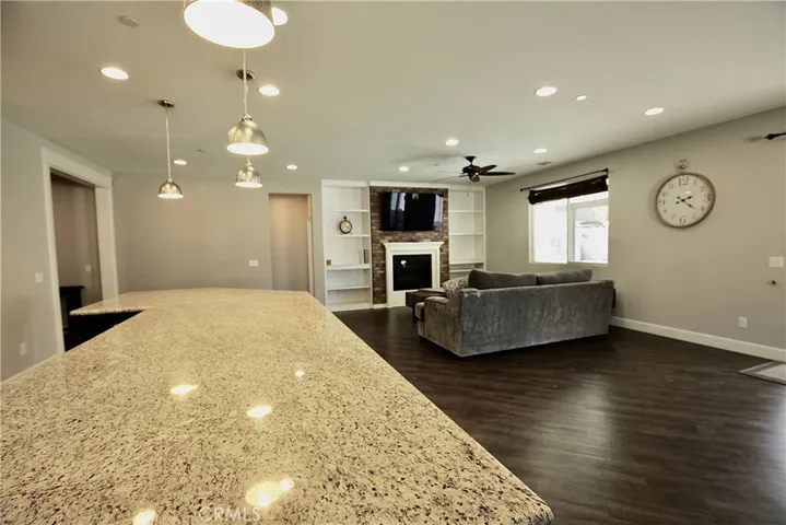 Massive granite countertop with room for 6+ barstools