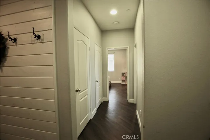 Hallway leading to 2 secondary bedrooms.