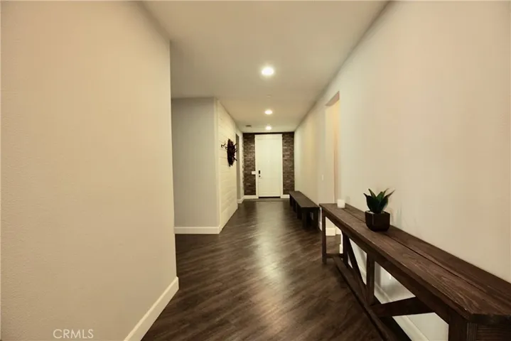 Hallway leading to entry door