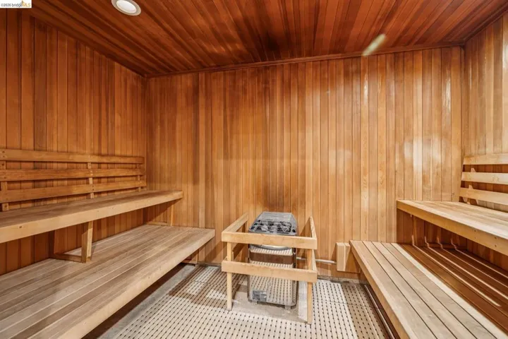 Sauna with wooden ceiling and wooden walls
