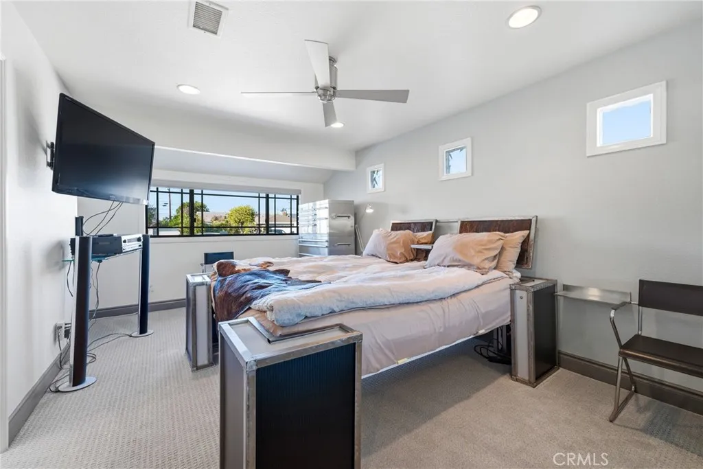 Serene owner’s suite with great natural light and a comfortable layout.