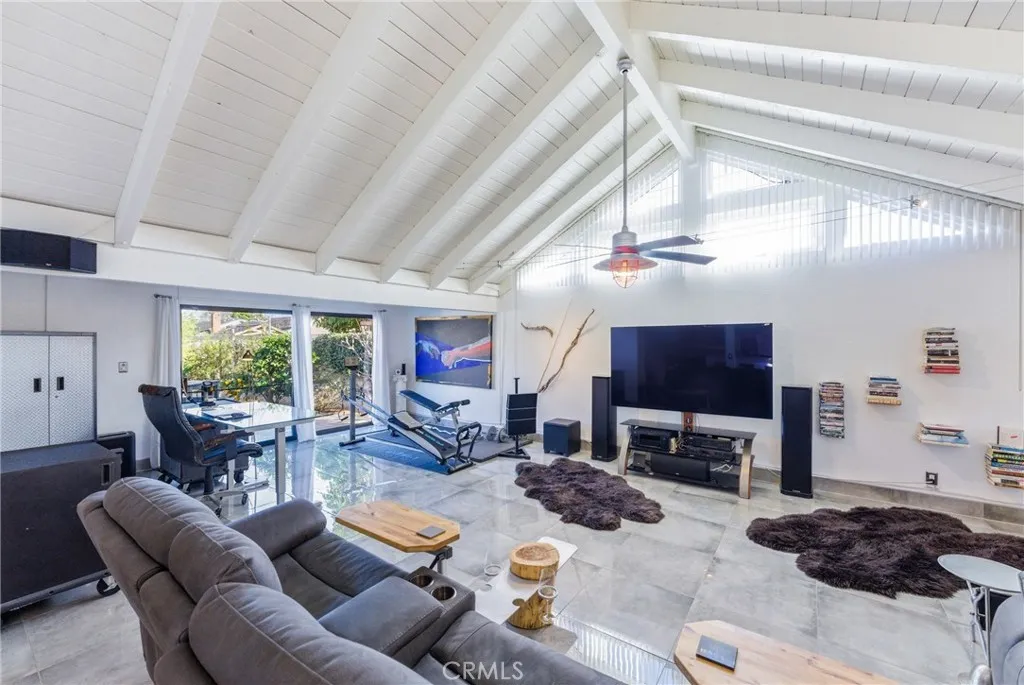 Vaulted ceilings and upper windows bring in beautiful natural light.