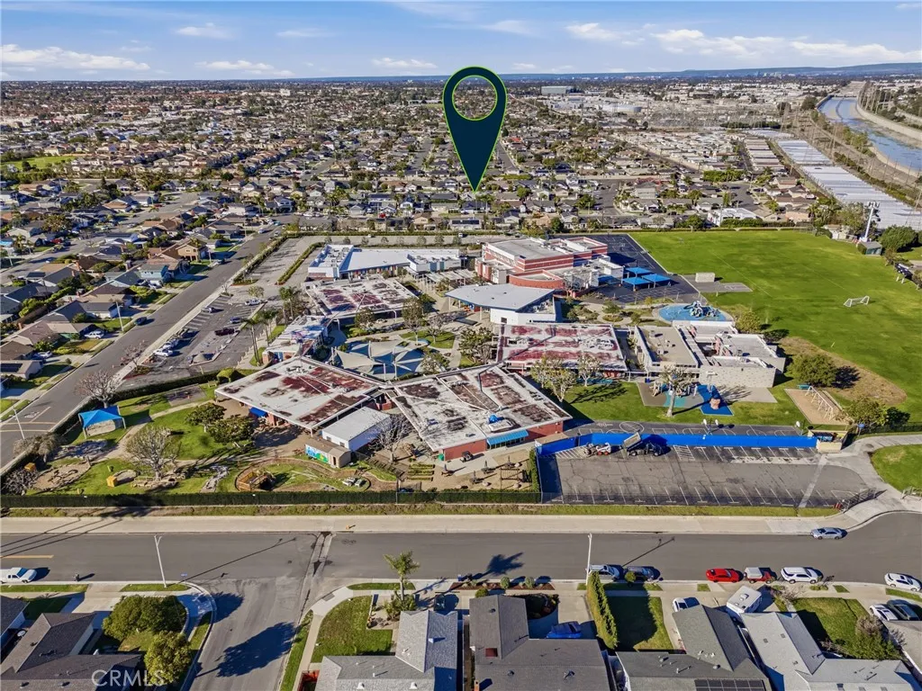 Elevated angle showing proximity to nearby parks, schools, and coastal access routes.