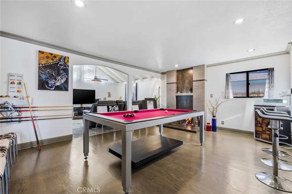 Another angle highlighting the dining room’s open connection to the kitchen and living room