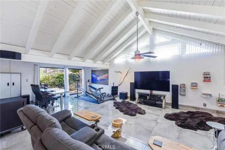 Vaulted ceilings and upper windows bring in beautiful natural light.