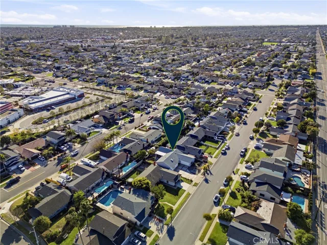 Overhead angle illustrating the extended driveway and expanded living space addition.