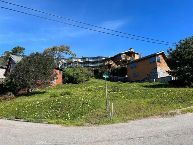Looking up at the property standing at the intersection of Ogden & Randall Dr.