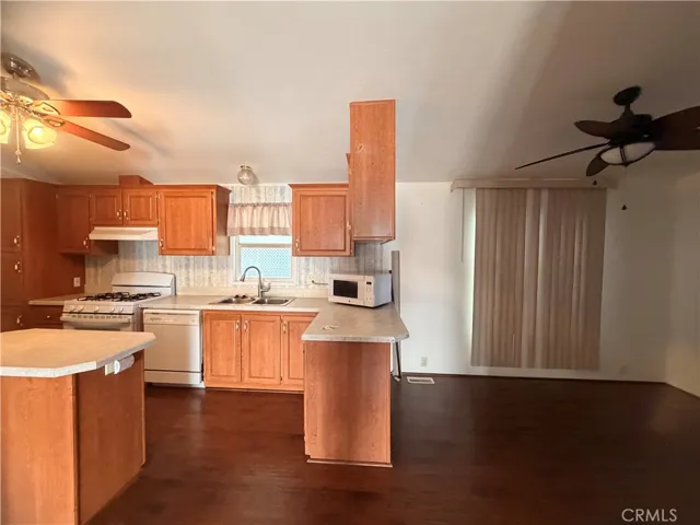 Kitchen Looking Into TV Room