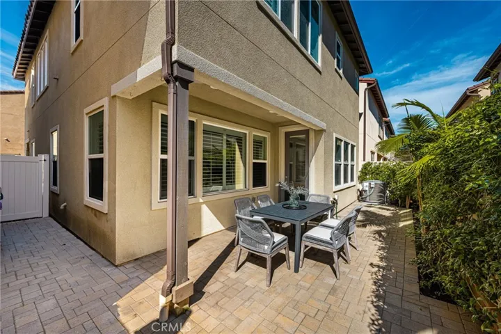 Beautiful outdoor area with access to the trash area and front of the home