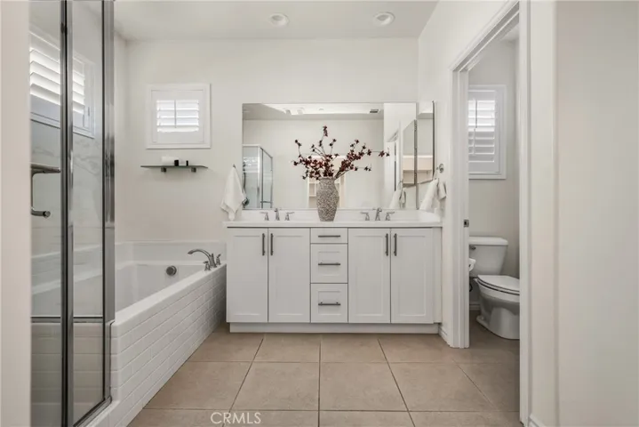 Primary spa like bath and water closet