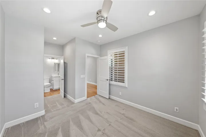 guest room with primary bathroom