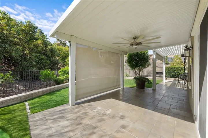 pull down automatic blinds for shad on patio with ceiling fan
