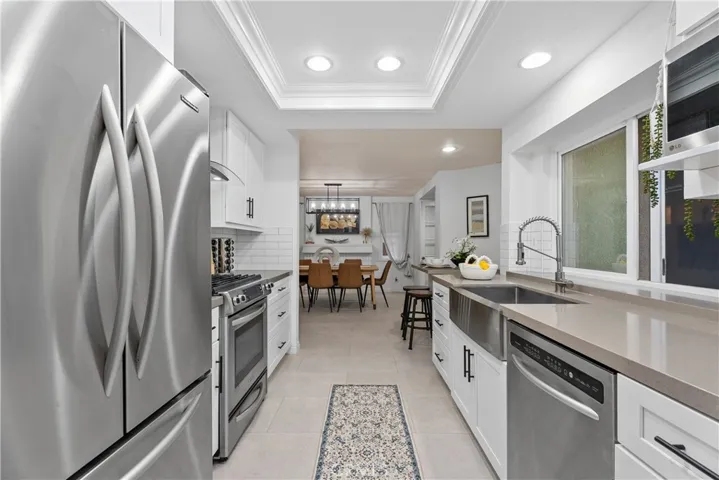 Kitchen with stone counters & stainless appliances