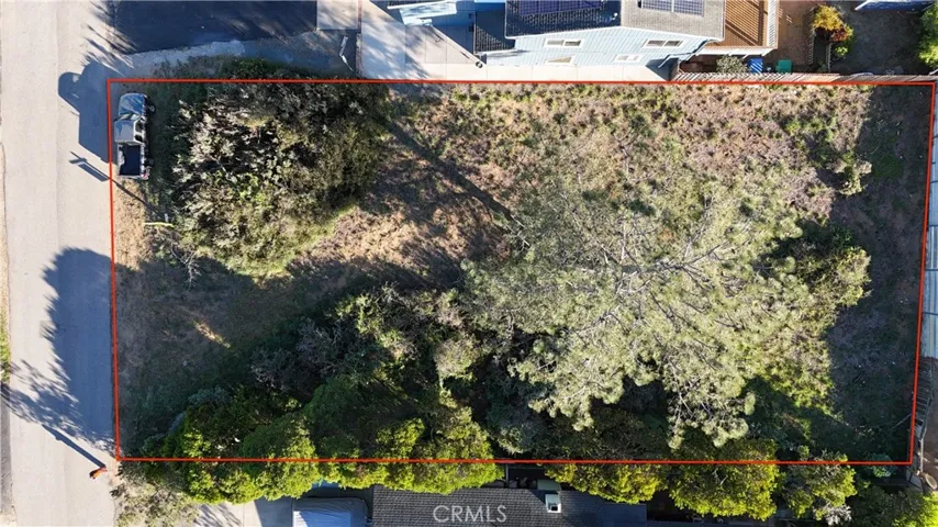 Red property lines are approximate.