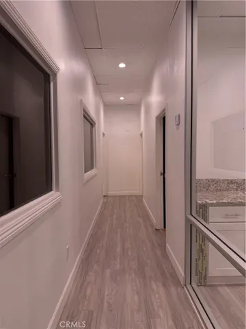 Hallway to the bathroom and kitchenette
