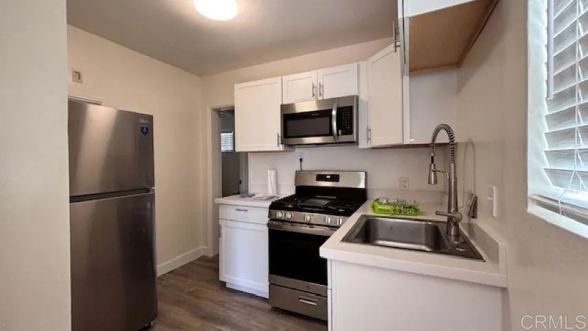 Back lower unit, smallest of all 8 units, Unit 722E of the 5 unit parcel