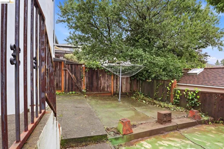 View of fenced backyard