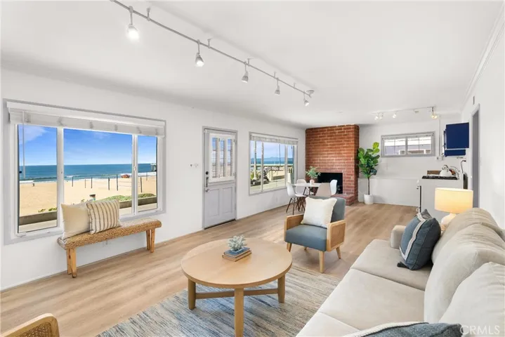 Unit D (1 Bed/1 Bath Unit) - Entry, Living Room, Dining Area, and Kitchenette.