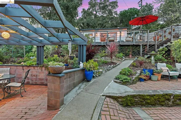 View of patio / terrace with outdoor dining area and a deck