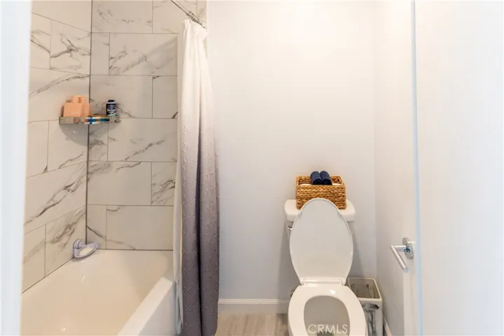 Full bathroom with soaking tub & shower