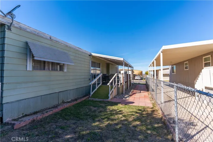 Fenced yard and covered porch