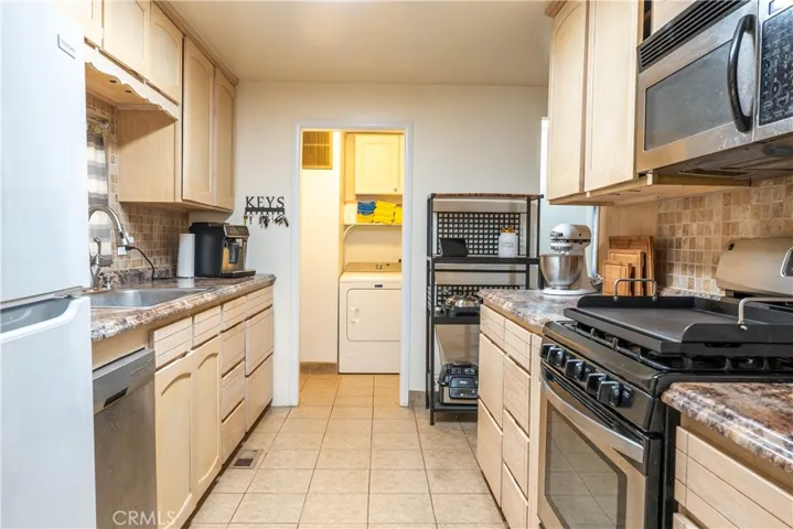 Kitchen facing laundry room