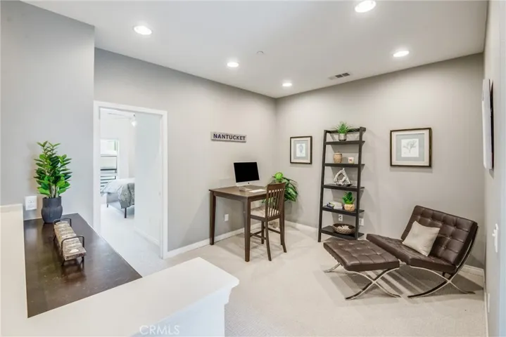 Upstairs flex room currently stages as an office makes for a great den, office, nursery, upstairs TV room.....