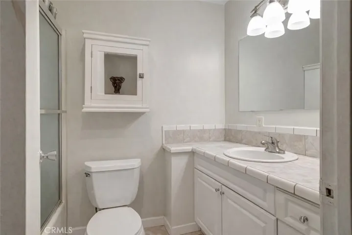 Hallway bathroom (virtually staged)