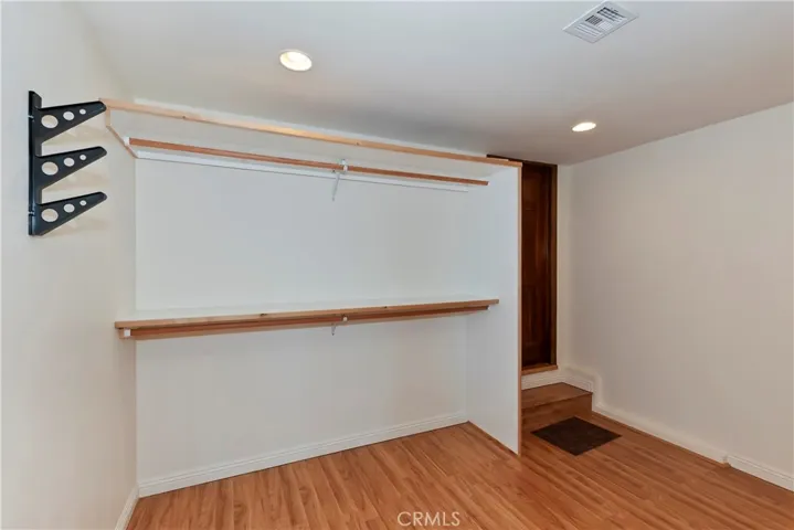 Primary BR spacious closet, & access to finished basement