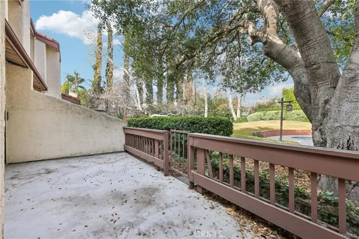 Back patio.direct access to garden& pool area