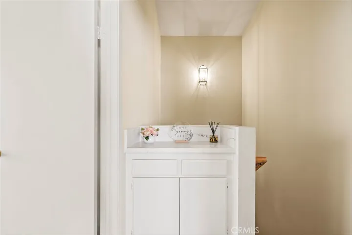 Built -in linen cabinet.
