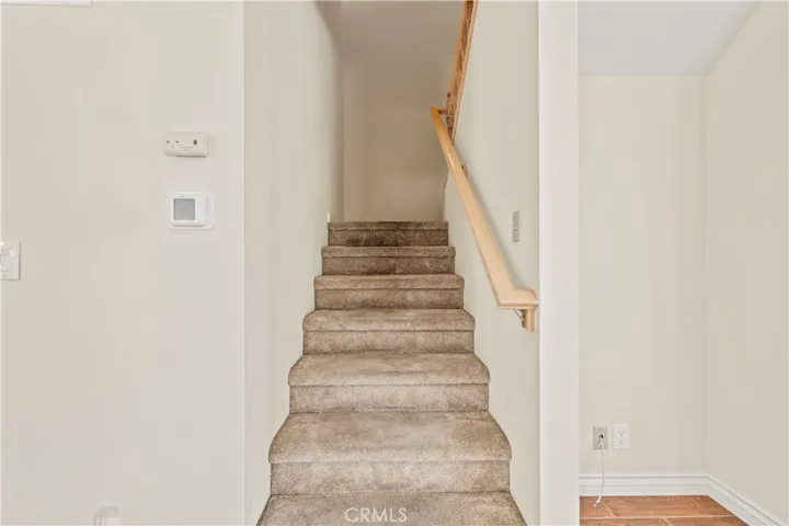 Plush carpet and classic handrail.