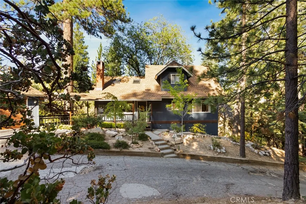 Easy access in all seasons at this corner home via two city-plowed main roads, and an access road!