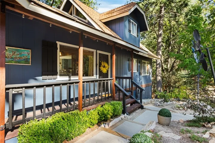 Easy access in all seasons at this corner home via two city-plowed main roads, and an access road!