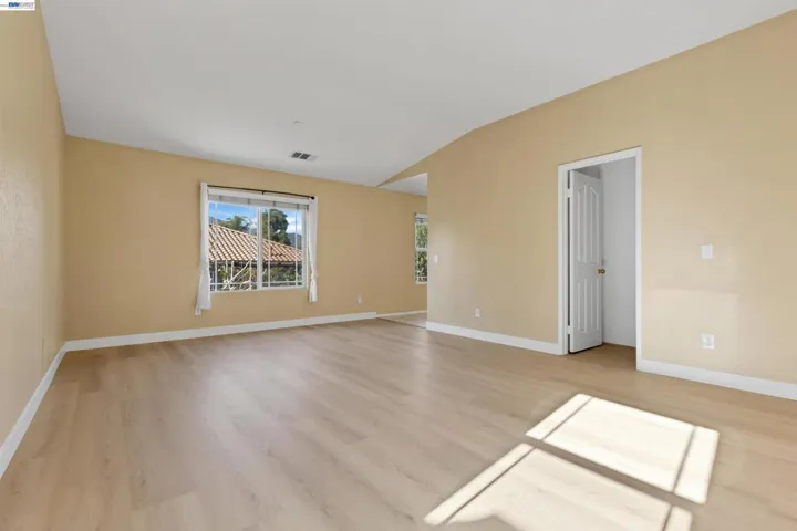 Primary Bedroom with Primary Bathroom and walk-in closet
