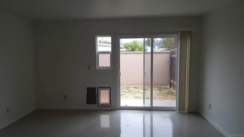 Sliding door leading to private backyard.
