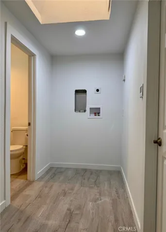 Hallway to bedroom 3, restroom and washer/dryer