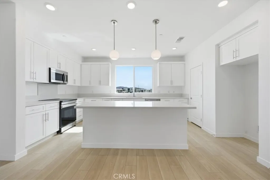 Large Kitchen Center Island and Pendant Lighting