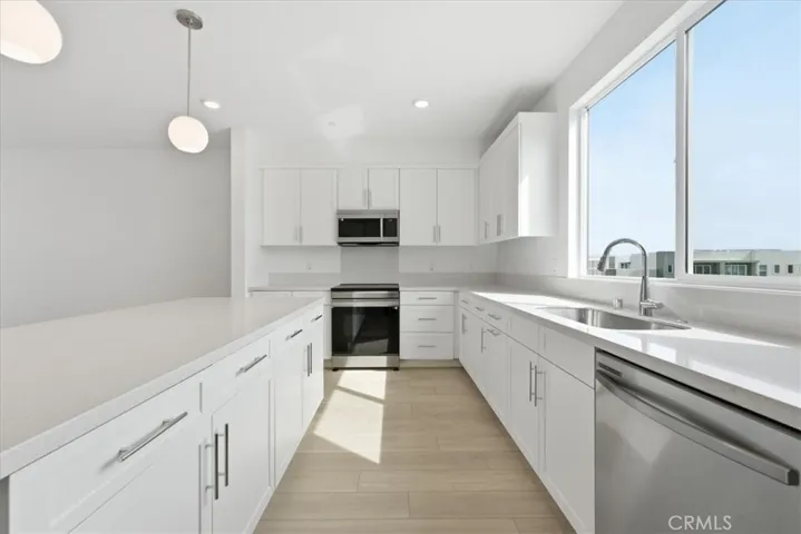 Large Kitchen with Oversized window over sink