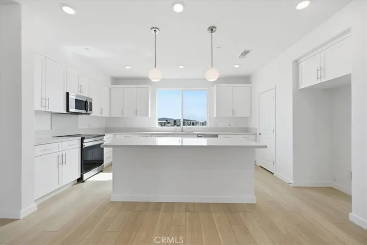 Large Kitchen Center Island and Pendant Lighting